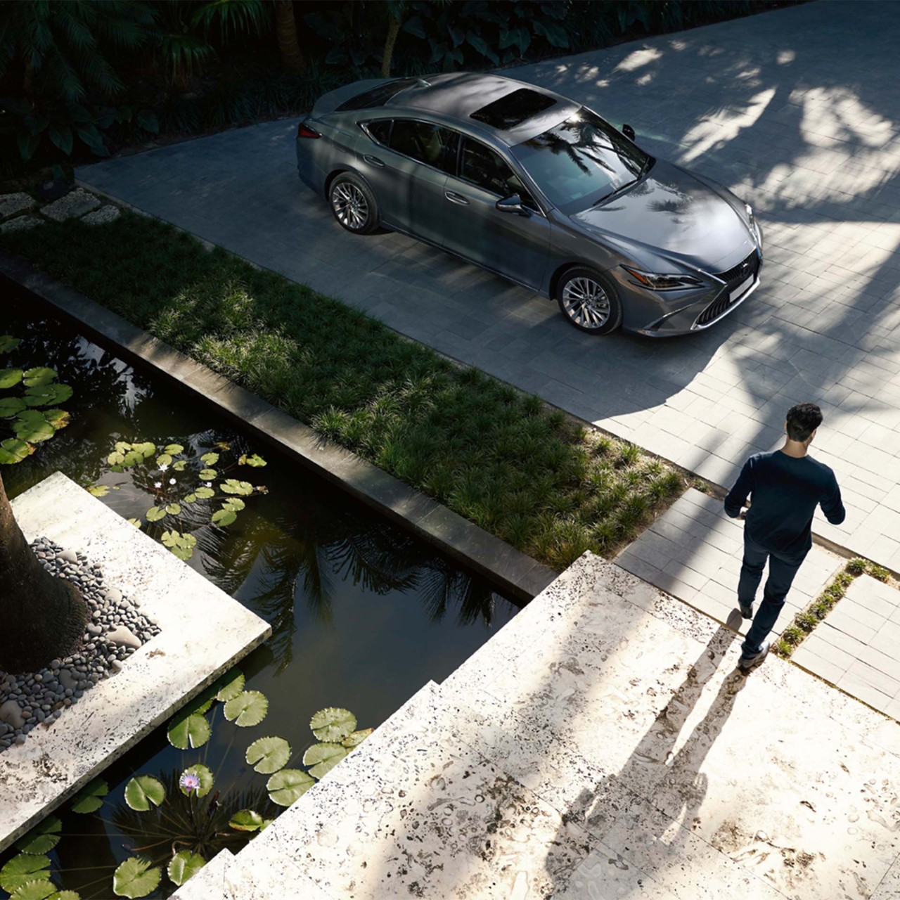 A Lexus mechanic changing a cars engine oil 